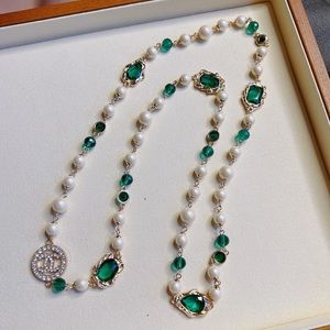 Chanel crystal c logo with green glass beads vintage necklace